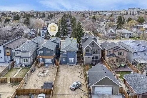 Aerial view of the residential street in Edmonton with the duplex marked by a pin